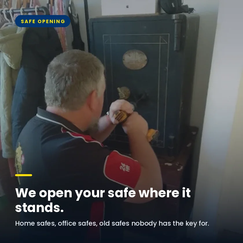 An AAA Locksmiths safe technician opening a large safe in a Cape Town home