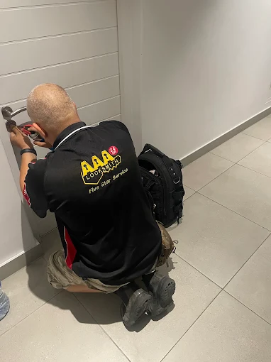 AAA Locksmiths technician fitting a residential cylinder